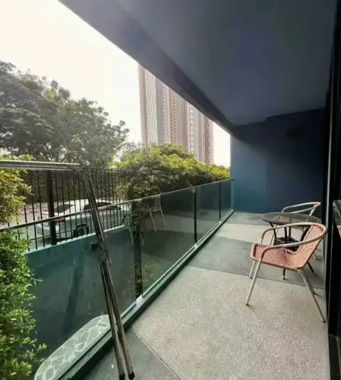 1 Bedroom Condo for Rent at Acqua Condo balcony seating area with city skyline view