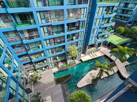 2 Bedroom Condo for Sale at Acqua Condo aerial view of building facade and resort-style swimming pool