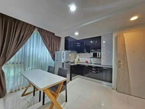 1 Bedroom Condo for Rent at Acqua Condo kitchen with black cabinets, fridge and dining table