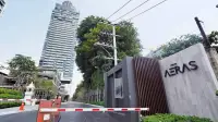 1 Bedroom Condo for Sale at Aeras entrance gate with security booth and signage in Pattaya