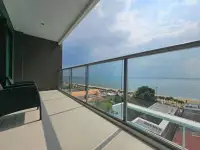 1 Bedroom Condo for Sale at Aeras private balcony with seating and panoramic ocean view