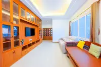 6 Bedroom House for Sale & Rent at Amorn Village, open-plan dining area with kitchen in the background.