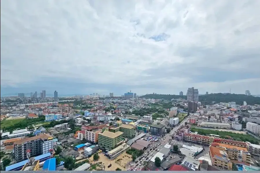 2 Bedroom Condo for Sale at Arcadia Millennium Tower panoramic high-rise view of Pattaya cityscape and hills