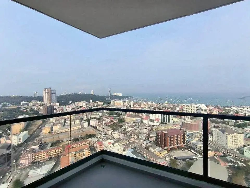 2 Bedroom Condo for Sale at Arcadia Millennium Tower high-floor balcony view of Pattaya city and coastline