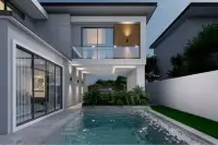4 Bedroom House for Sale at Areeya Villa rear exterior with private pool, glass balcony and tropical landscaping at night