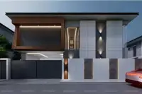 4 Bedroom House for Sale at Areeya Villa contemporary front facade with wood accents, LED lighting and gated driveway