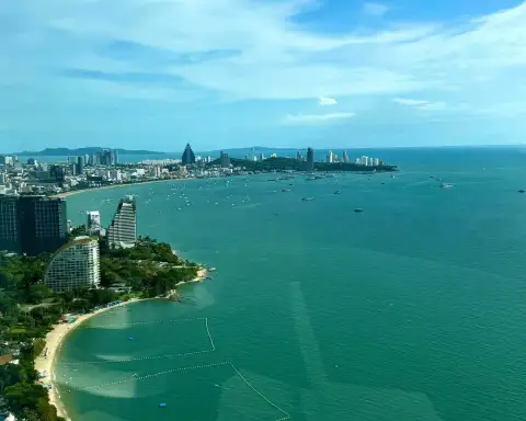 1 Bedroom Condo for Rent at Arom Wongamat aerial view of Pattaya Bay coastline and skyline