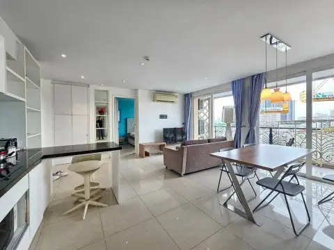 2 Bedroom Condo for Sale at Atlantis Condo Resort open-plan kitchen, dining table and living area with balcony view