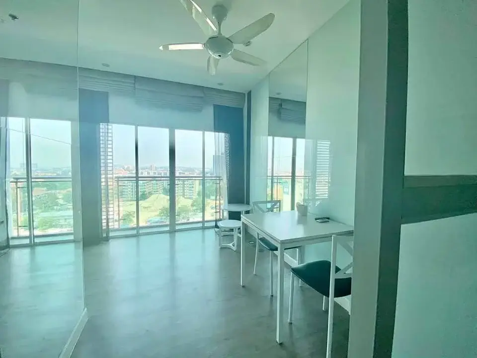 1 Bedroom Condo for Sale at Axis Pattaya Condo living area with floor-to-ceiling windows and city view