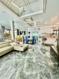 4 Bedroom House for Rent at Baan Balina 3 spacious living and dining area with marble flooring and modern kitchen
