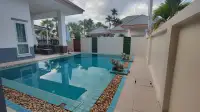 3 Bedroom House for Rent at Baan Dusit Garden 6 private pool with elephant statues and covered patio seating