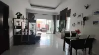 3 Bedroom House for Rent at Baan Dusit Garden 6 open-plan living and dining area with glass dining table
