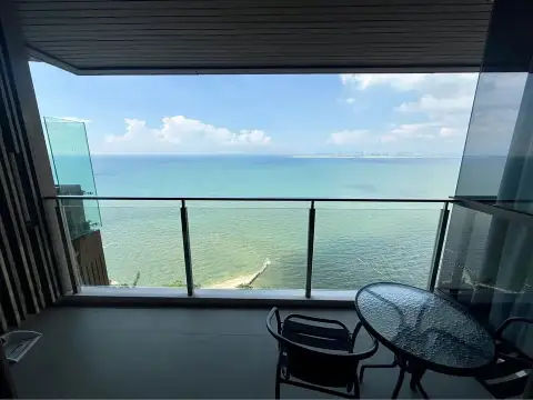 2 Bedroom Condo for Rent at Baan Plai Haad balcony table and chairs overlooking turquoise ocean
