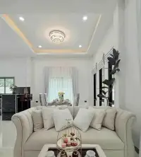 3 Bedroom House for Sale in Bang Lamung cream sofa living room with tray ceiling lighting