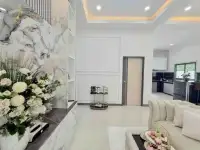 3 Bedroom House for Sale in Bang Lamung marble accent wall near kitchen and hallway