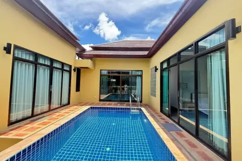 3 Bedroom House for Rent in Bang Sare backyard swimming pool surrounded by bedrooms with sliding doors