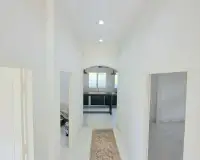 4 Bedroom House for Sale in Bang Sare hallway leading to kitchen with runner rug and tiled floor