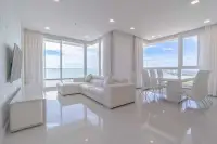 3 Bedroom Condo for Sale at Bay View Resort bright living and dining area with sea view windows