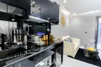 1 Bedroom Condo for Sale at Grand Solaire Pattaya sleek kitchen and dining area