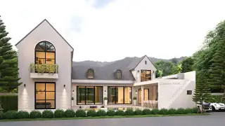 Castle Hill modern house with black and orange accents, lush trees, and blue sky.