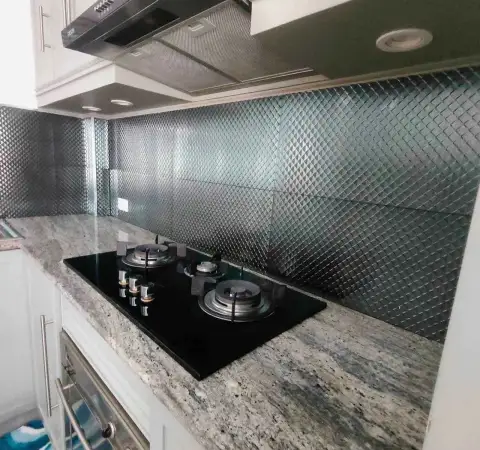 3 Bedroom House for Rent at Central Park 4 kitchen with granite countertop, gas stove, and tiled backsplash