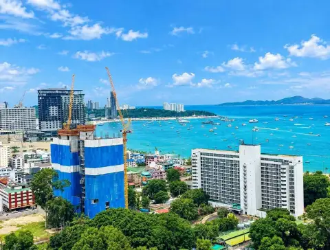 1 Bedroom Condo for Sale at Centric Sea aerial view of Pattaya skyline and turquoise ocean