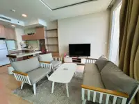 1 Bedroom Condo for Rent at Cetus Beachfront living room with gray sofas, coffee table and TV unit