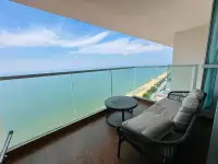 1 Bedroom Condo for Rent at Cetus Beachfront private balcony with seating and beachfront ocean view
