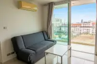 1 Bedroom Condo for Sale at Amazon Residence living area with balcony and city skyline view
