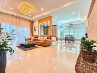 3 Bedroom House for Rent in Chak Nok open-plan living and dining area with glass doors
