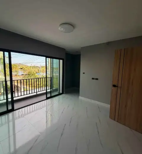 2 Bedroom Townhouse for Sale in Chak Nok bedroom with balcony access and scenic outdoor view