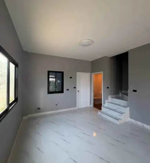 2 Bedroom Townhouse for Sale in Chak Nok upper floor landing with staircase and en-suite bathroom