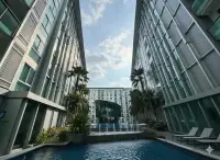 1 Bedroom Condo for Rent at City Center Residence courtyard pool with fountains between towers