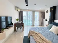 1 Bedroom Condo for Rent at City Center Residence bedroom with TV console and balcony view