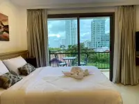Studio Condo for Sale at City Garden Pratumnak bedroom with balcony overlooking Pattaya city skyline