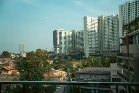 1 Bedroom Condo for Rent at City Garden Tropicana balcony view of Pattaya high-rise buildings and skyline