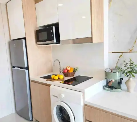 Studio Condo for Sale at City Garden Tropicana compact kitchenette with fridge, microwave and washing machine