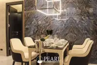 2 Bedroom Condo for Sale in Grand Solaire Pattaya master bedroom with king-size bed and city view