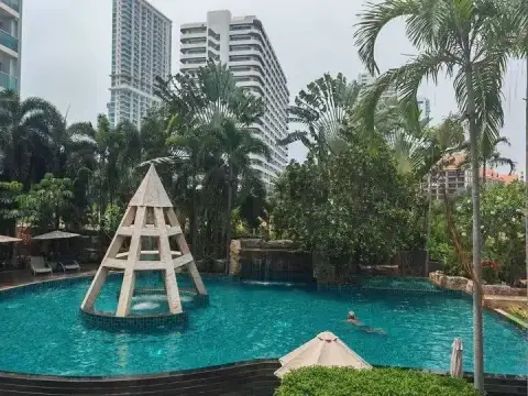 1 Bedroom Condo for Rent at Club Royal outdoor swimming pool with fountain feature and city skyline