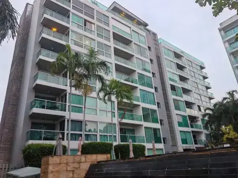1 Bedroom Condo for Rent at Club Royal exterior building facade with glass balconies and palm trees