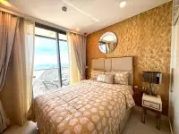 1 Bedroom Condo for Rent at Copacabana Beach Jomtien bedroom with balcony and ocean view