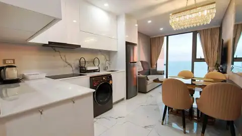 2 Bedroom Condo for Rent at Copacabana Beach Jomtien modern kitchen and living area with sea view