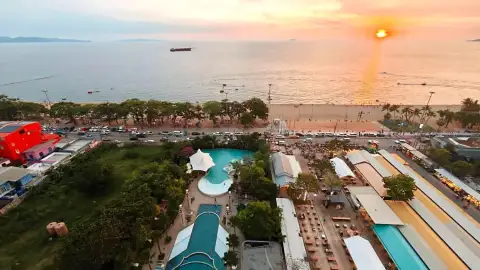 2 Bedroom Condo for Rent at Copacabana Beach Jomtien aerial sunset view of beach and resort pools