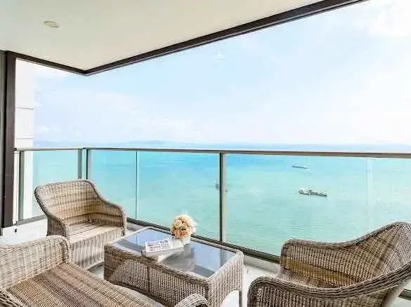 2 Bedroom Condo for Rent at Copacabana Beach Jomtien balcony with rattan seating and sea view