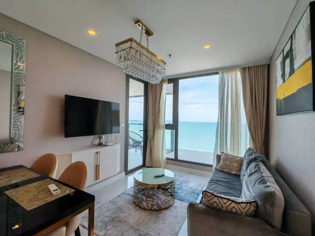 2 Bedroom Condo for Rent at Copacabana Beach Jomtien living room with sea view and crystal chandelier