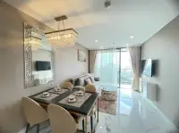 1 Bedroom Condo for Sale at Copacabana Beach Jomtien open-plan living and dining space with balcony and city view