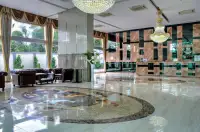 1 Bedroom Condo for Sale at Cosy Beach View grand lobby with marble flooring, crystal chandeliers and leather sofas
