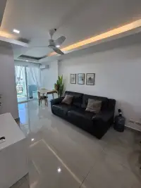 1 Bedroom Condo for Sale at Cosy Beach View open living room with sofa, balcony door and ceiling fan