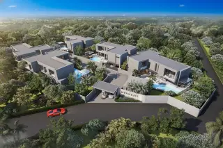 D Space Pattaya modern luxury villa exterior with private swimming pool, patio, and parked cars at dusk.
