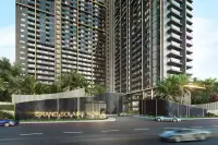 3 Bedroom Condo for Sale at Grand Solaire Noble bedroom with wall-mounted TV and panoramic city view
